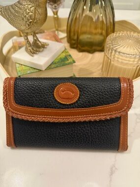 Dooney & Bourke Black Pebbled Leather Trifold Wallet with Brown Trim